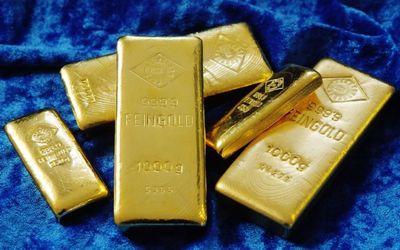 Gold eases as data lift European shares