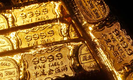 Gold price tumbles to three-year low