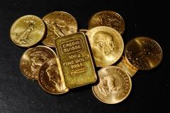 PRECIOUS-Gold lower as dollar strengthens