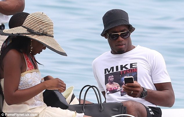 Who knew he was a fan: Footballer Didier Drogba wears a Mike Tyson T-shirt as …