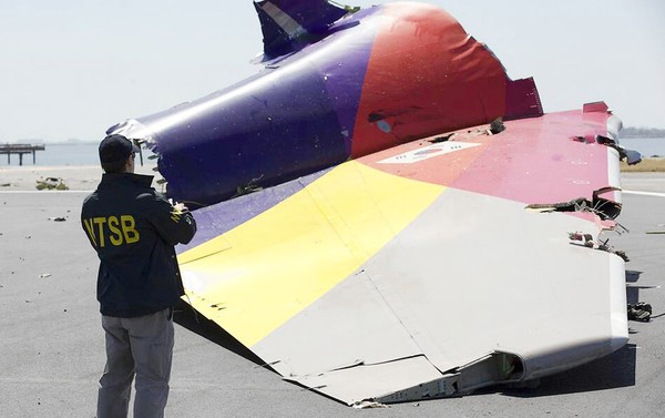 Asiana Evacuation Delayed as Fire Spread Outside Crashed Jet