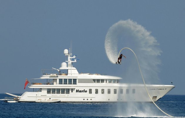 Joining the jet set: Holidaymakers soar above the waves on water jet packs