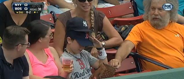 Deceptive young Red Sox fan pulls off greatest con of all time [VIDEO]