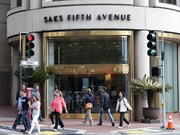 UPDATE 4-Hudson's Bay CEO bets big on department stores with Saks buy