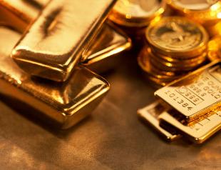 PRECIOUS-Gold inches up after drop, but Fed stimulus concerns stay