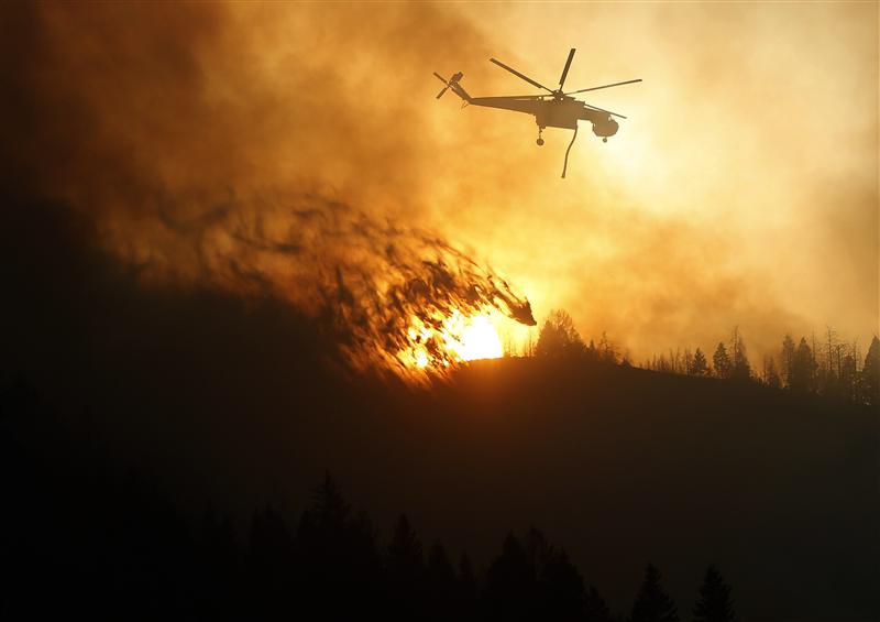 Firefighters step up battle in Idaho blaze menacing resort towns