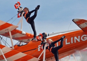 Daring wingwalkers take to the skies with aerial stunts