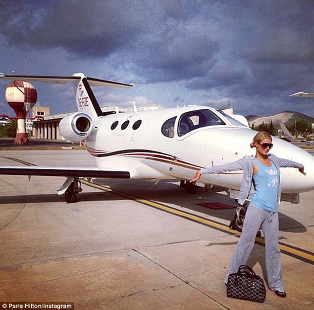 No need to boast! Paris Hilton flaunts her decadent lifestyle as she poses in …