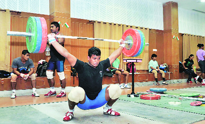 In 16-yr-old's weightlifting gold, a lift for 'criminal village'