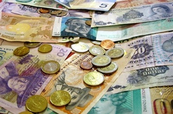 Currency Moves Dent Multinationals' Earnings