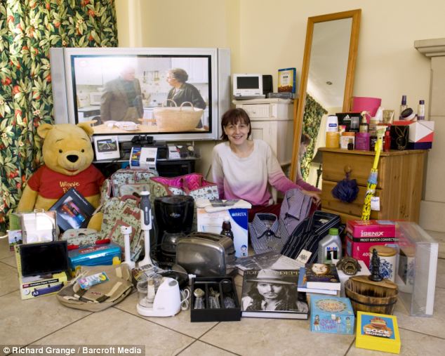 Woman who enters a HUNDRED contests a day lands £100000 haul of prizes …