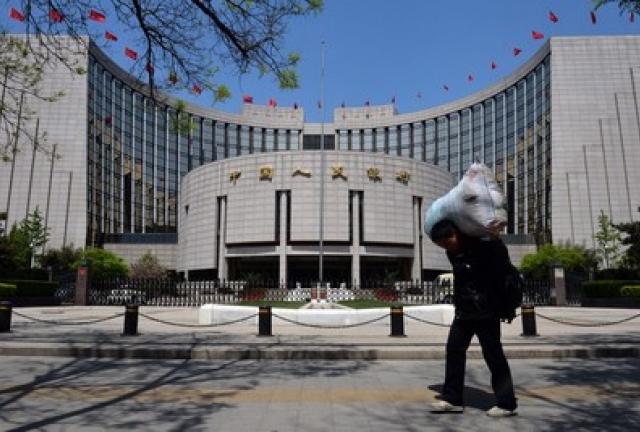 UPDATE 1-China to ease gold trade restrictions – central bank