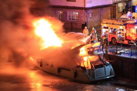 Luxury yacht engulfed in flames