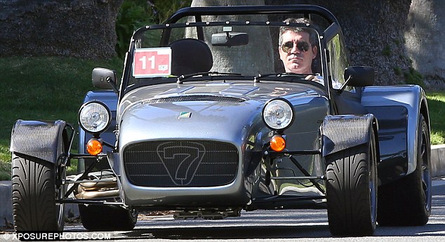 Simon Cowell takes luxury sports car for a spin after special delivery to his …