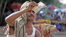 As rupee's gains slow, doubts about India grow