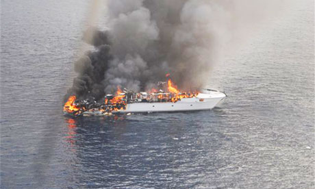 Passengers abandon ship as luxury yacht burns