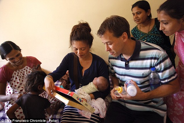 Moment mother meets her baby and surrogate for the first time 9000 miles away …