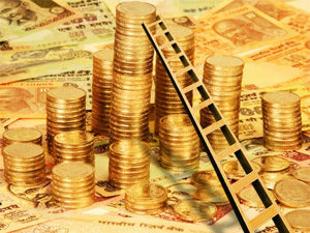 Gold futures marginally up on global cues