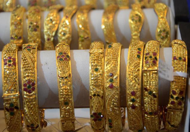 Gold, silver plunge on sluggish demand, weak global cues