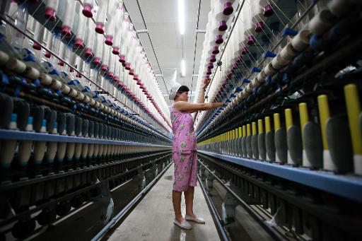 GLOBAL ECONOMY-US factories hit by shutdown, China production rises