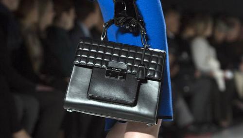 Michael Kors beats rivals in luxury retail