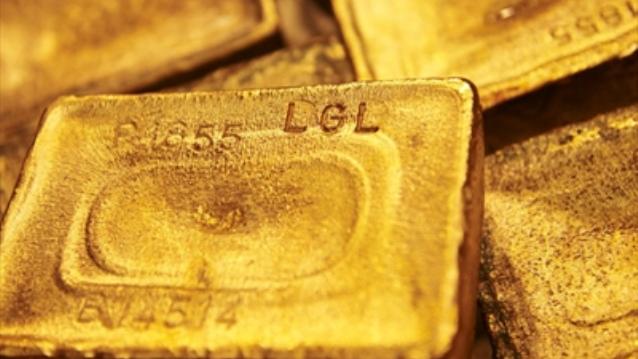 Gold at three-week low on Fed stimulus outlook