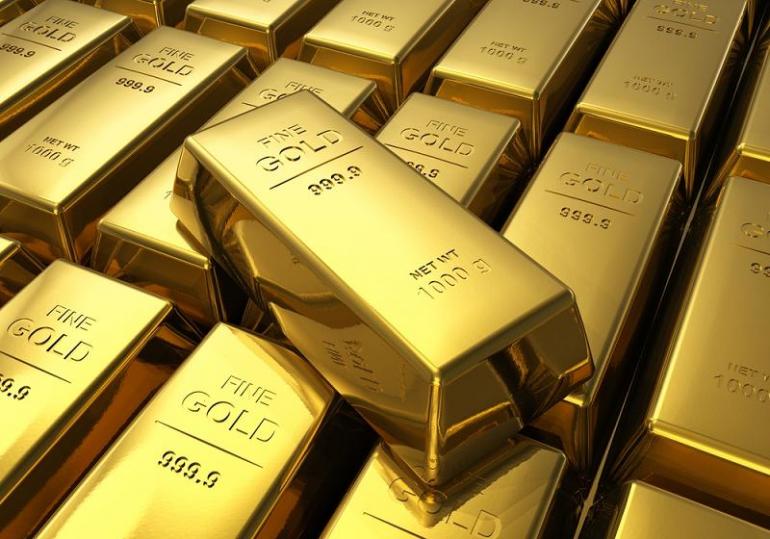 PRECIOUS-Gold prices turn flat after Iran deal, track oil