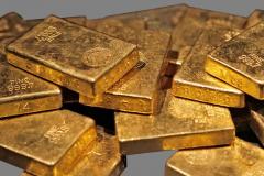 Gold subdued by Fed tapering risk