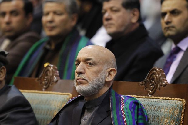Afghanistan's Karzai stands alone in high-stakes game with US