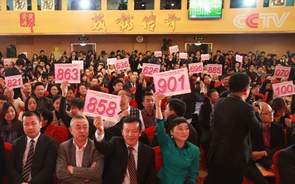 CCTV auction seeing baijiu bids down, auto speeding up