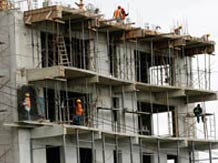 Other sectors ignore slowdown, rush into real estate