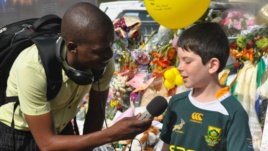 Flowers, Tributes Outside Mandela Home Showcase Rainbow Nation