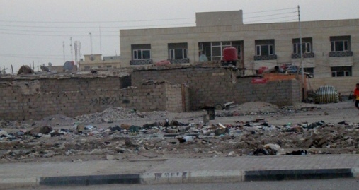 one man's rubbish: basra's poor fight for wealthy neighbours' garbage