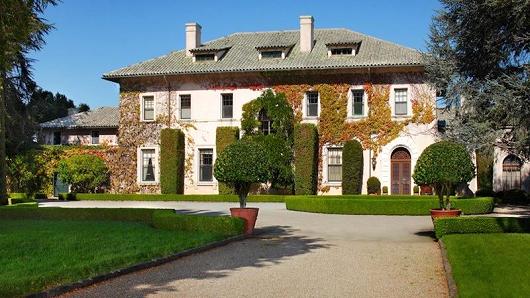 Which home will sell for $100 million in 2014?
