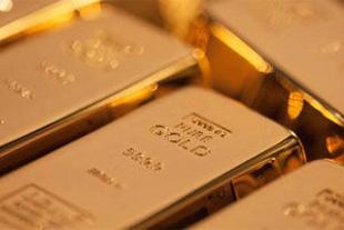Gold drifts lower, set for biggest annual loss in three decades