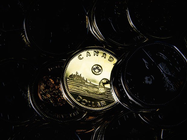 Canadian dollar sinks to 3-year low as trade deficit balloons