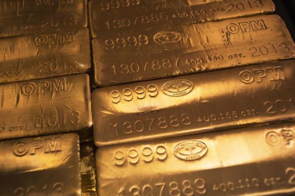 PRECIOUS-Gold rises 1.5 pct after weak payrolls, posts weekly gain