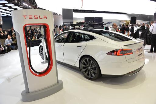 At Auto Show, Tesla Defends Safety Record