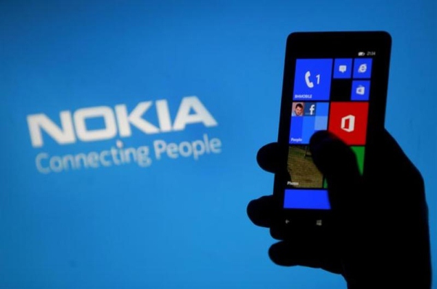Nokia reports fall in mobile sales and profits ahead of Microsoft handover