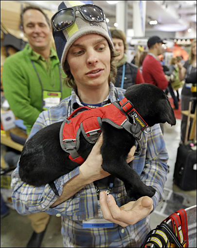 Expo for outdoor gear has luxury for people, plus many items for dogs