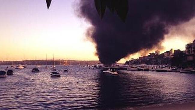 The plume of smoke soared above Double Bay Marina in Sydney's Eastern …