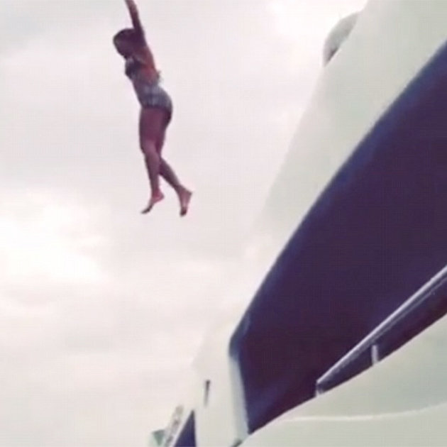 Beyonce's daredevil antics continue as she jumps from luxury yacht