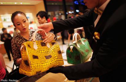 8 employees use $116k loot to pay for luxury items