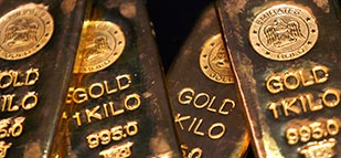 Gold trim gains on upbeat US retail sales, jobless claims data