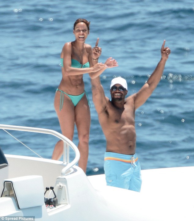 Nicole Murphy, 46, reveals bikini body while jumping off a yacht in St. Barts