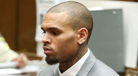 Planes, chains and automobiles: Chris Brown's miserable trip to trial