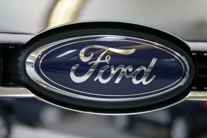 Ford profit falls; costs up in North America