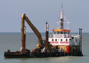 Superyacht puts on weight send in the dredgers