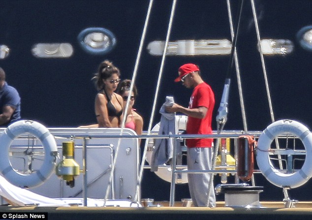 Making waves! Nicole Scherzinger and Lewis Hamilton take a break from the …