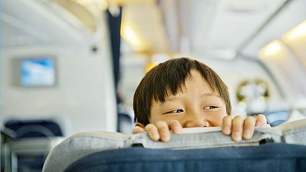 Should children be banned from business class on planes?